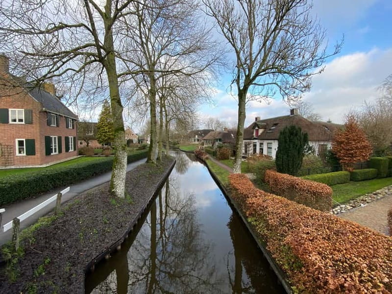 Amsterdam: Giethoorn, Afsluitdijk and Zaanse Schans Day Trip - Afsluitdijk photo stop: Dutch water engineering in one memorable break