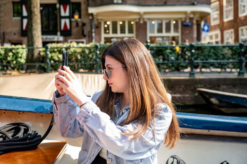 Amsterdam: Guided City Highlights Open Boat Canal Cruise - A’DAM Lookout, NEMO, the Amstel, and Magere Brug for evening-friendly photos