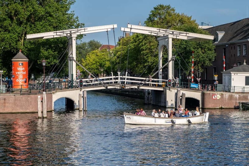 Amsterdam: Guided City Highlights Open Boat Canal Cruise - 75 minutes on the water: what the pacing really feels like