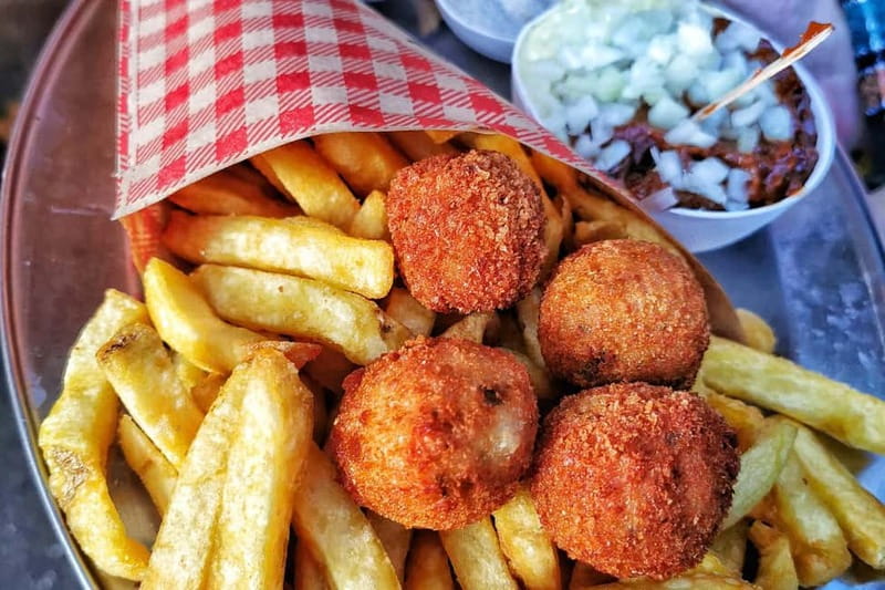 Amsterdam: Guided Food Tour with Tastings - The savory start: sandwiches, bitterballen, and classic Dutch snacks