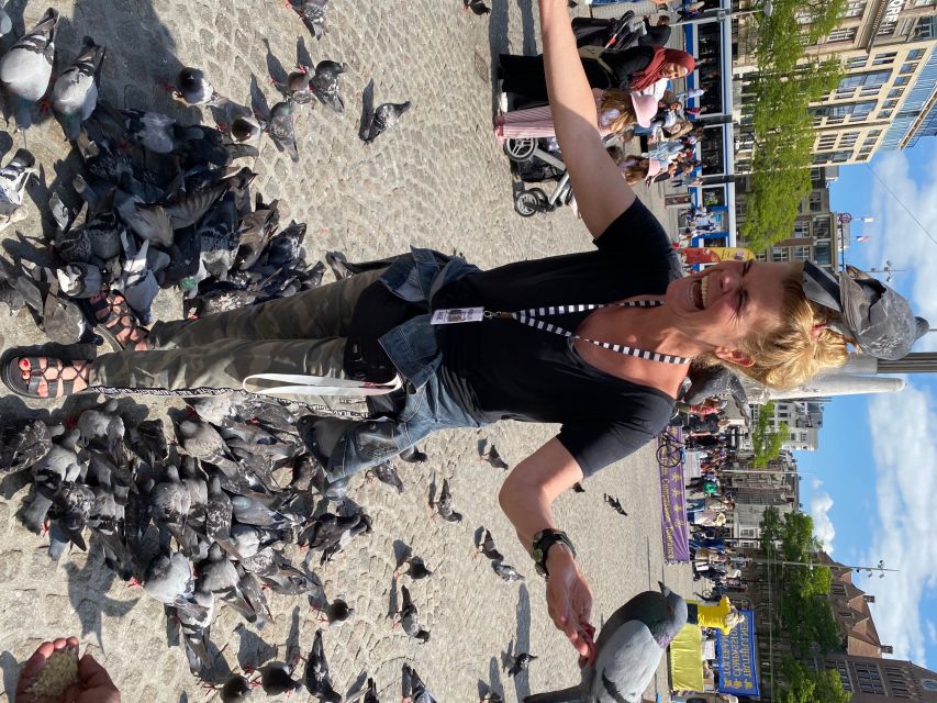 Amsterdam: Guided Off-The-Beaten-Track Walking Tour - Entering Amsterdam by Beursplein, then straight to Dam Square
