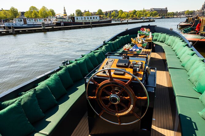 Amsterdam: Guided Open Boat Canal Cruise Unlimited Drinks Option - Quick hits before you board
