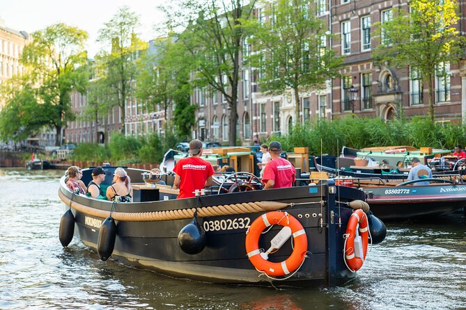 Amsterdam: Guided Open Boat Canal Cruise Unlimited Drinks Option - How to choose your seats and set expectations for the guide