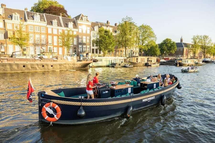 Amsterdam: Guided Open Boat Cruise Unlimited Drinks Option - Electric open-boat cruising makes Amsterdam feel closer