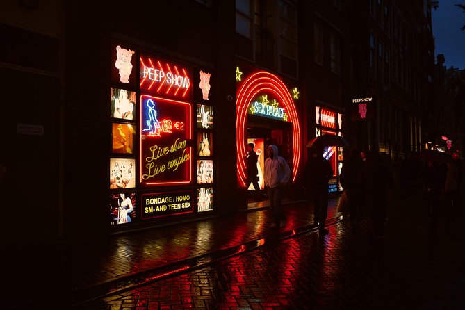 Amsterdam: Guided Red Light District and City Walking Tour - Pub The Ape (Int Aepjen), a rare wooden survivor