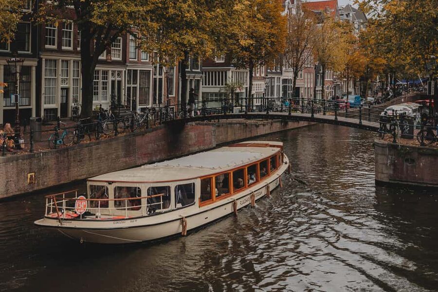 Amsterdam: Heated Canal Cruise with Unlimited Drinks & Bite - The Skinny Bridge, Amstel Hotel, and Grachtengordel Views That Land