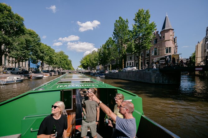 Amsterdam Heineken Cruise with 1 Heineken, Snacks, Live Guide - Heineken Experience area: former brewery vibes from the water