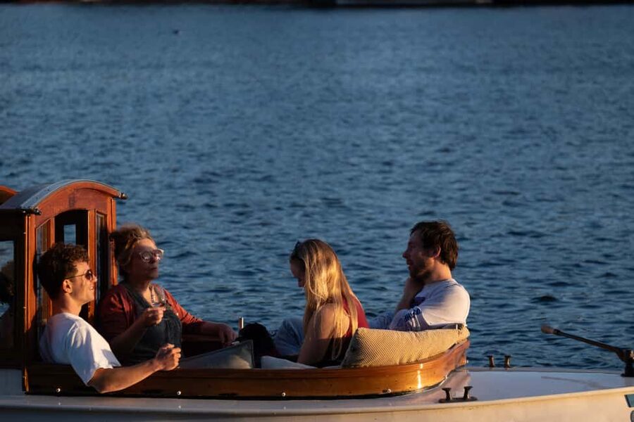 Amsterdam: Hidden Gems Canal Cruise - Captain Beer turns the canals into a real neighborhood tour