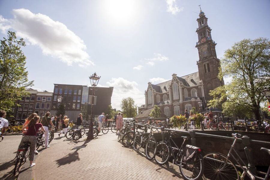 Amsterdam: Hidden Gems & Highlights Guided Bike Tour - Jordaan backstreets and Canal Ring bridges, plus those overlooked churches and courtyards