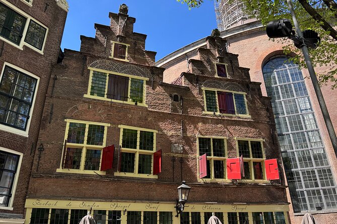 Amsterdam Highlights and Hidden Gems Walking Tour with Fun Guide - Old Harbor area: the secret-feeling streets you only catch on foot