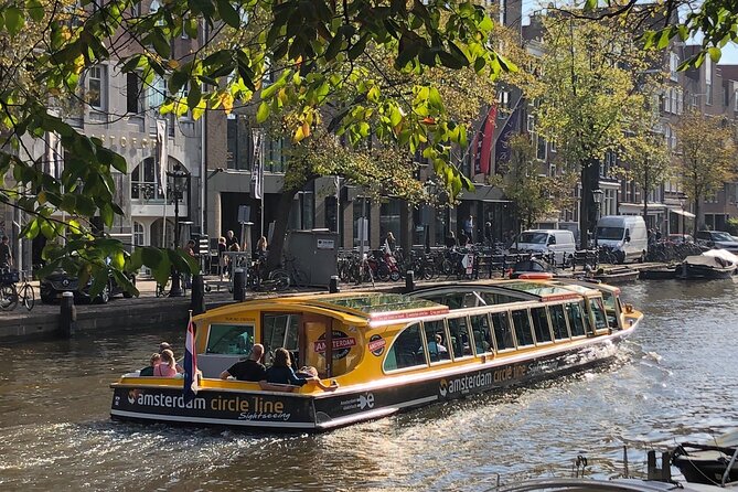 Amsterdam: Historic City Sightseeing Canal Cruise - Guides, Captains, and the Humor Factor