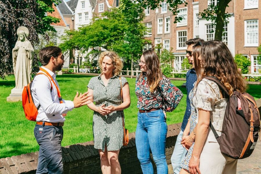 Amsterdam: Historical Highlights Walking Tour with Tasting - Flower Market and Amstel River: the classic views plus real-life Amsterdam