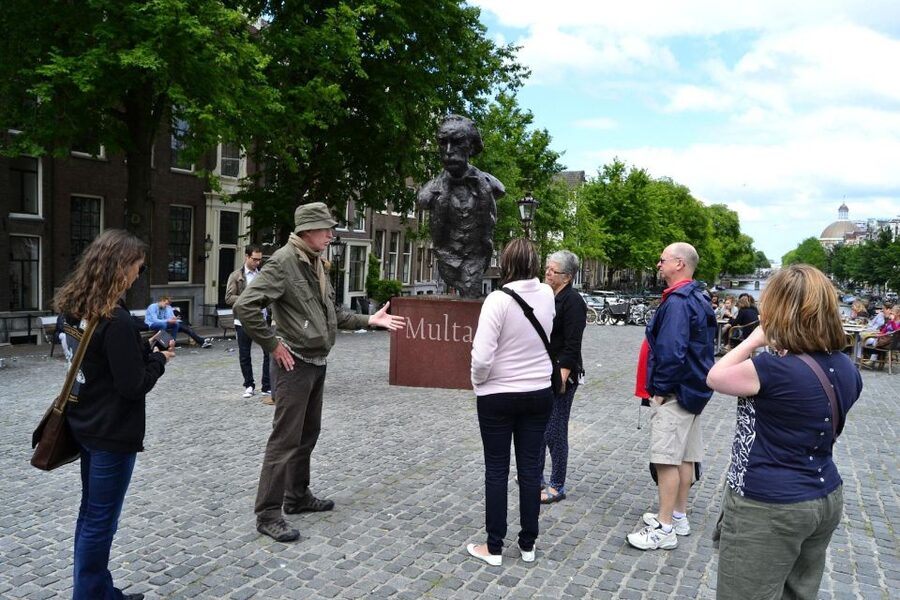 Amsterdam: History, Culture & Hidden Gems Walking Tour - Beursplein, the stock exchange square where Amsterdam’s story starts