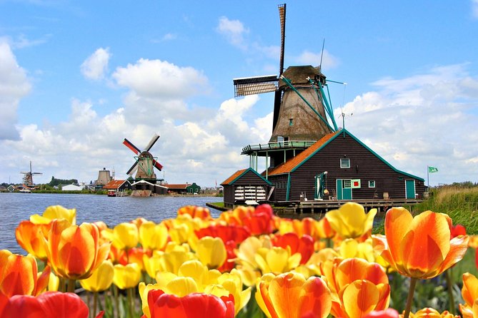 Amsterdam: Keukenhof and Zaanse Schans Windmills Guided Day Trip - Zaanse Schans windmill village: working mills, clogs, and a fast craft loop