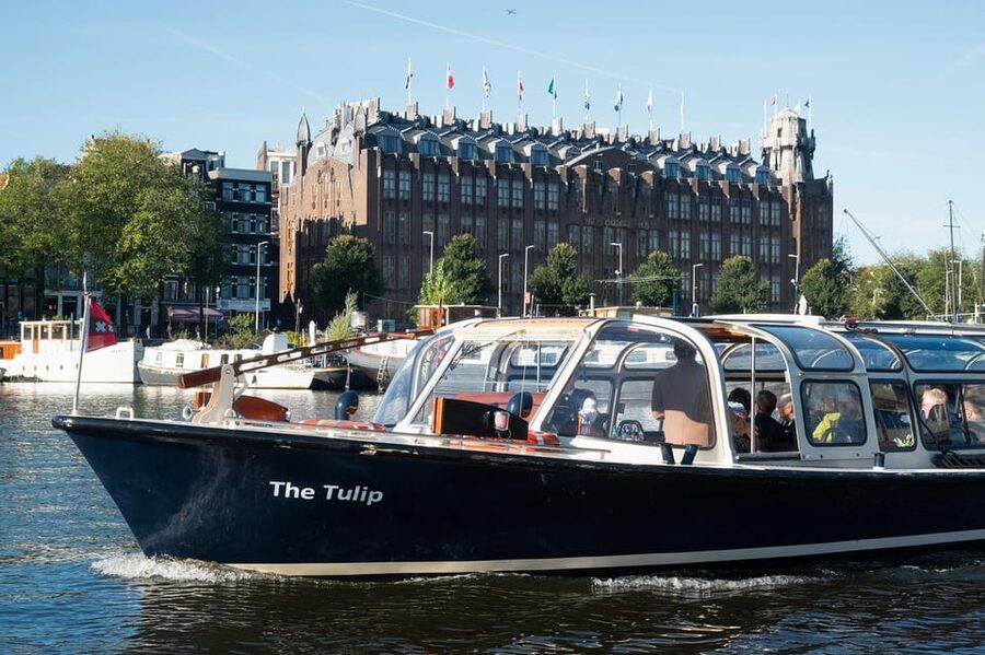 Amsterdam: Keukenhof Ticket with Shuttle Bus + Canal Cruise - Canal cruise time on your terms: 75 minutes of classic Amsterdam views