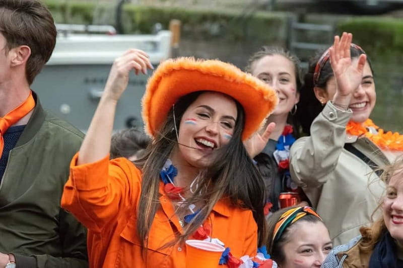 Amsterdam: Kings Day Boat Party with Unlimited Drinks - King’s Day from the water, and why it works so well