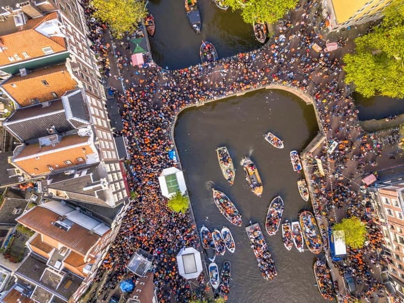 Amsterdam: Kings Day Boat Party with Unlimited Drinks - Unlimited drinks and music: what you actually get in 1.5 hours