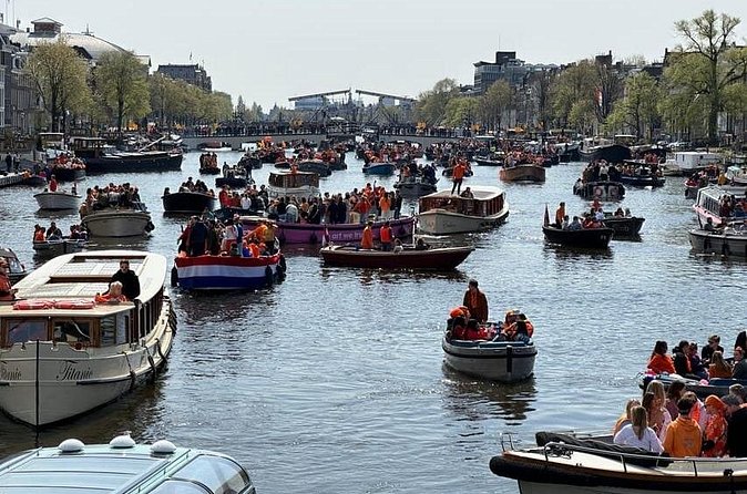 Amsterdam: Kingsday Party Cruise including Drinks - Live On-Board Commentary That Changes How You See the City