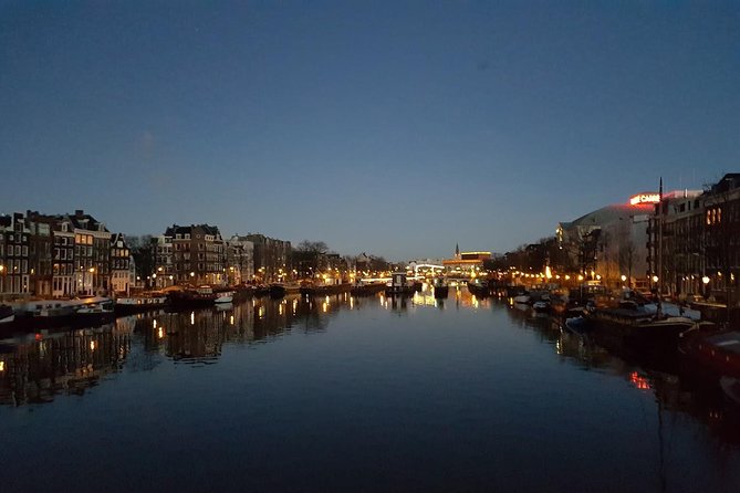 Amsterdam Layover: Airport Transit City Tour - Dam Square, the main station, and quick city framing photos