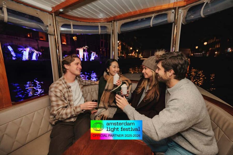 Amsterdam: Light Festival Heated Cruise + Hot Choco + Snack - The live English commentary: stories that keep the lights from feeling random
