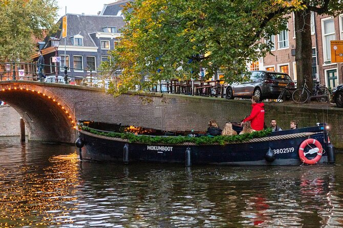 Amsterdam: Light Festival Open Boat - Unl. Drinks Option - Maritime museum area: a former Navy storage facility and big seafaring focus
