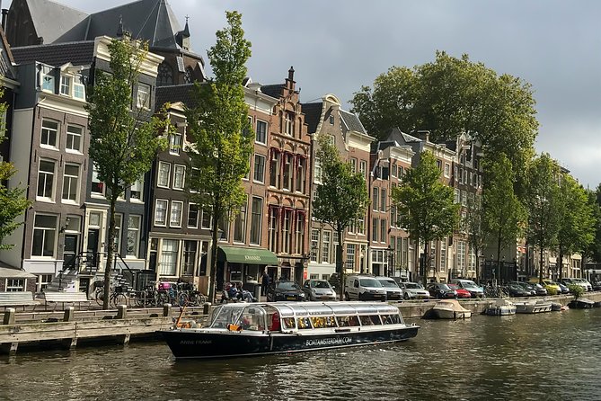 Amsterdam Live Guided Sightseeing Canal Cruise - Passing the Anne Frank House area: a landmark moment without the queue