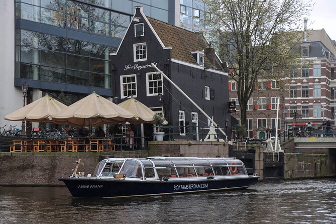 Amsterdam Live Guided Sightseeing Canal Cruise - Houseboat Museum and Museumhuis Bartolotti: the canal life angle