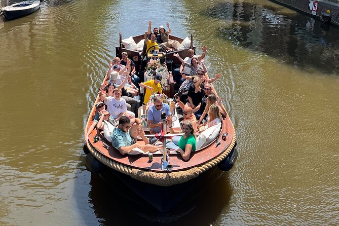 Amsterdam Luxury Boutique Boat tour with Unlimited Beer and Wine - Oude Kerk Area: Oldest Building, Oldest Parish Church Vibes