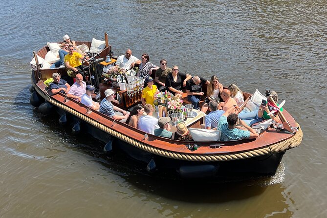 Amsterdam Luxury Boutique Boat tour with Unlimited Beer and Wine - Skinny Bridge Moment: Magera Brug and the Photo Pause