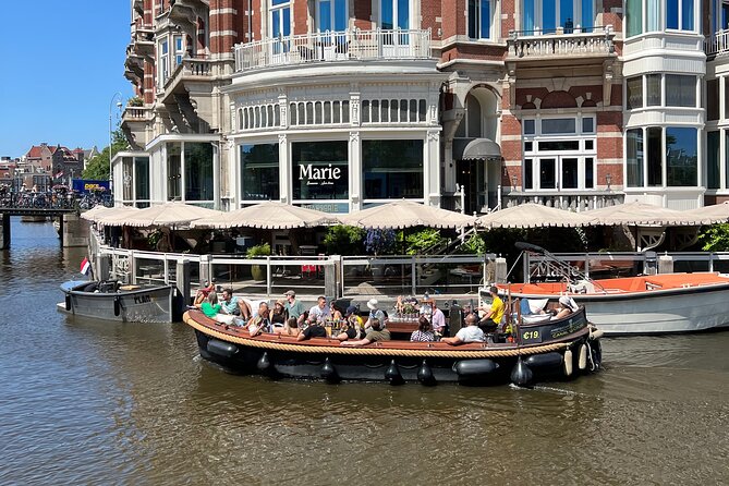 Amsterdam Luxury Boutique Boat tour with Unlimited Beer and Wine - Unlimited Beer and Wine: The Value Play, Plus a Smart Pace