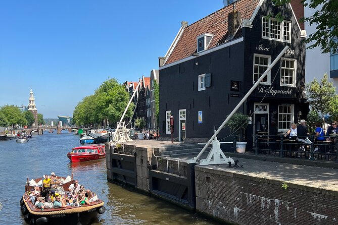 Amsterdam Luxury Boutique Boat tour with Unlimited Beer and Wine - Boats, Roofs, and Sightlines: Open Boat Might Not Mean Unblocked Views