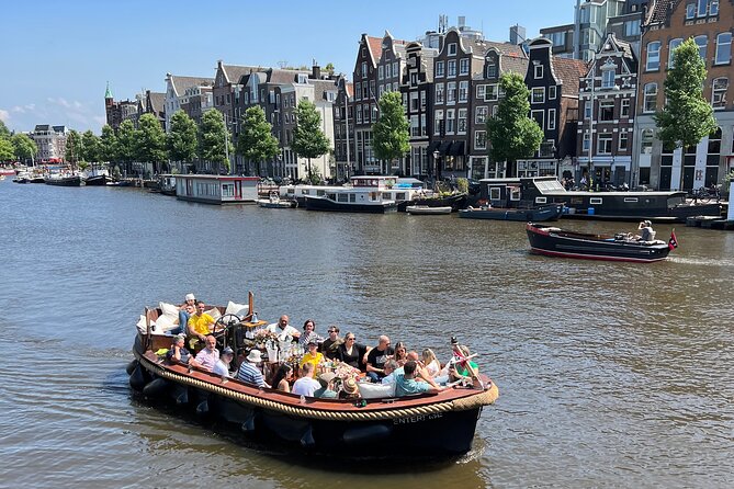 Amsterdam Luxury Boutique Boat tour with Unlimited Beer and Wine - Where You Meet at Oudezijds Voorburgwal (And Why Timing Matters)