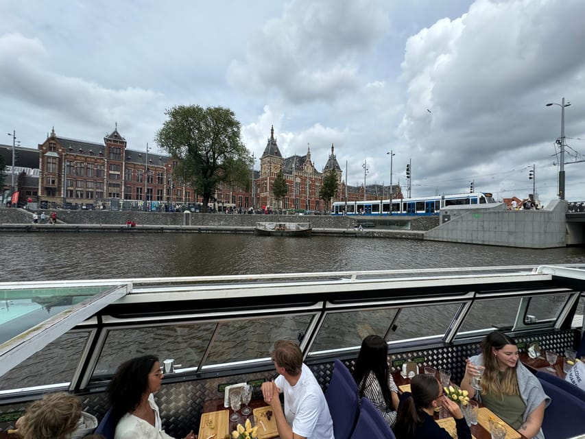 Amsterdam: Luxury Cheese & Wine Canal Cruise - Meeting at H’Art Museum dock, timing, and what to wear