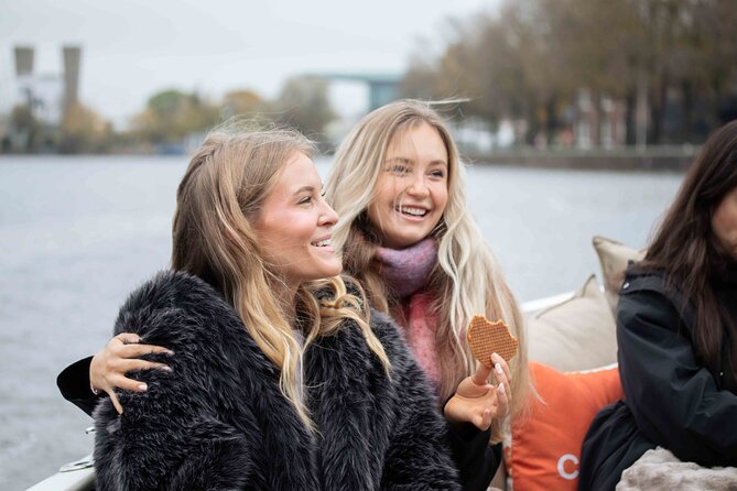 Amsterdam: Luxury Saloon Boat Cruise with Cocktails & Waffle - The 1-hour itinerary, stop by stop along Amsterdam’s canals
