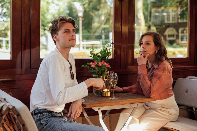 Amsterdam: Luxury Saloon Boat Cruise with Cocktails & Waffle - Friendship in a Storm and Dutch waffle, the smartest included perks