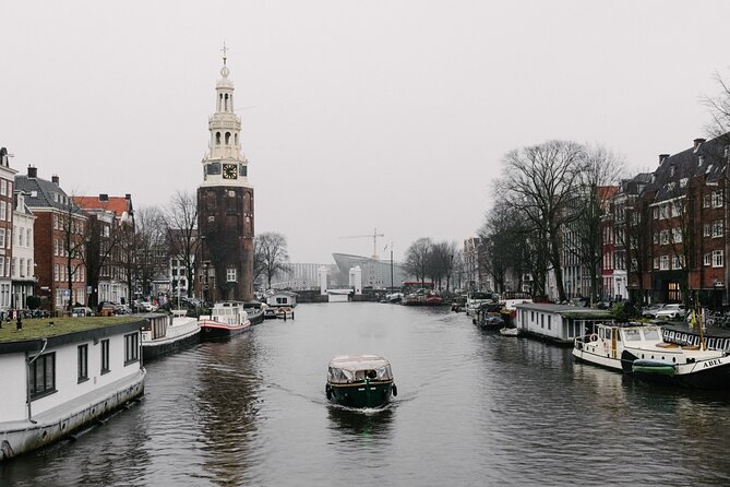 Amsterdam Newest Canal Cruise with local guide and small group - What you get from a local guide in 1 hour