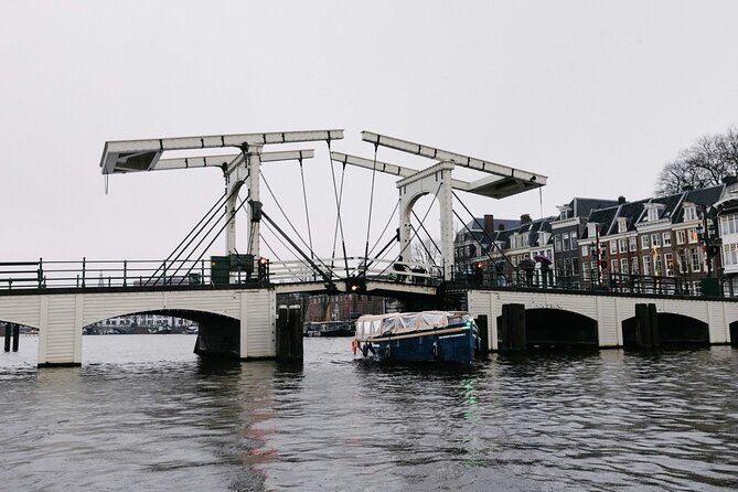 Amsterdam Newest Canal Cruise with local guide and small group - Zeedijk and the seam between old defenses and modern streets