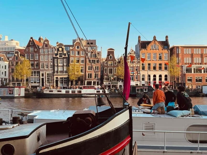 Amsterdam: Off the Beaten Path Bike Tour in French - From Amsterdam-Centrum to Prins Hendrikkade: canals you can ride, not just stare at