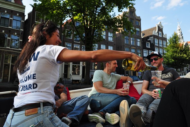 Amsterdam Open Boat Cruise in Old City Center with Live Guide - Live guide time, plus drinks that actually matter
