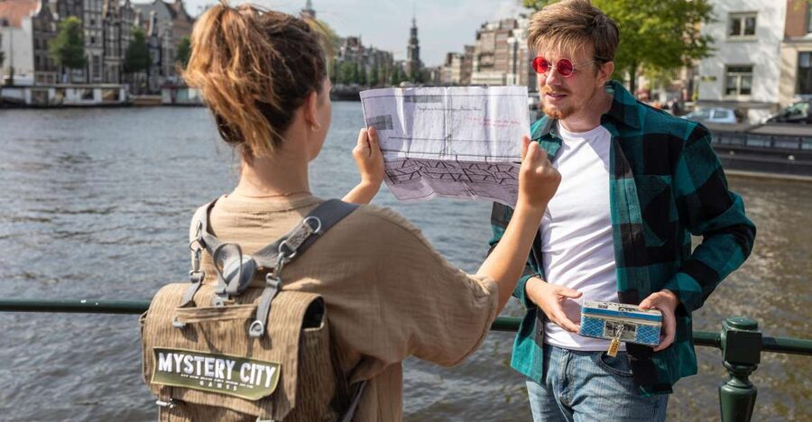 Amsterdam: "Operation 45 " Treasure Hunt Walking Tour - Your Mystery City Games pickup: the backpack is the whole point