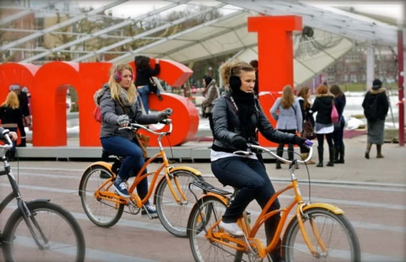 Amsterdam: Private Bike Tour - Old Warehouse District on Reclaimed Islands