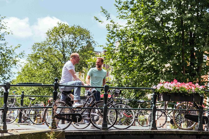 Amsterdam PRIVATE Bike Tour With Locals: Bike & Local Snack Included - Where you meet, what you ride, and how the 2.5 hours really works