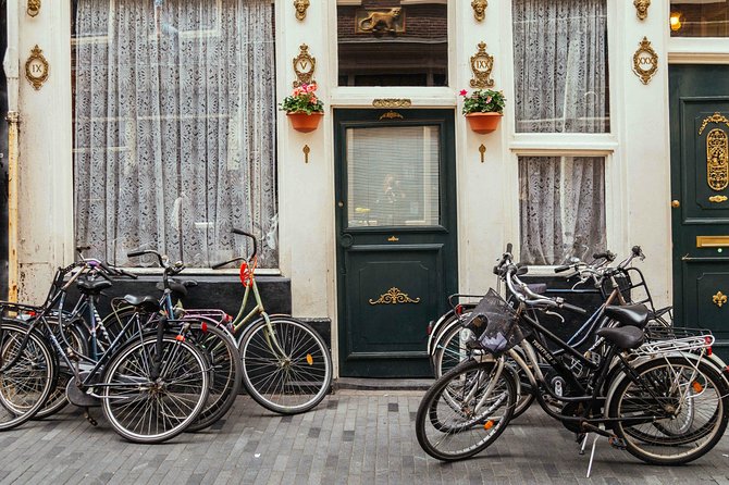 Amsterdam PRIVATE Bike Tour With Locals: Bike & Local Snack Included - The route highlights: Westerkerk, Magere Brug, and the streets in between