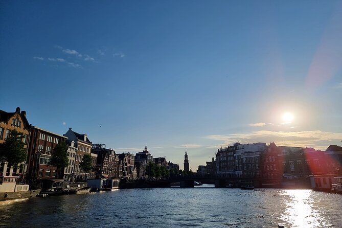 Amsterdam Private Boat Tour With Drinks - EN ES FR - Anne Frank House from the water, plus Westerkerk and the blue-crown clue