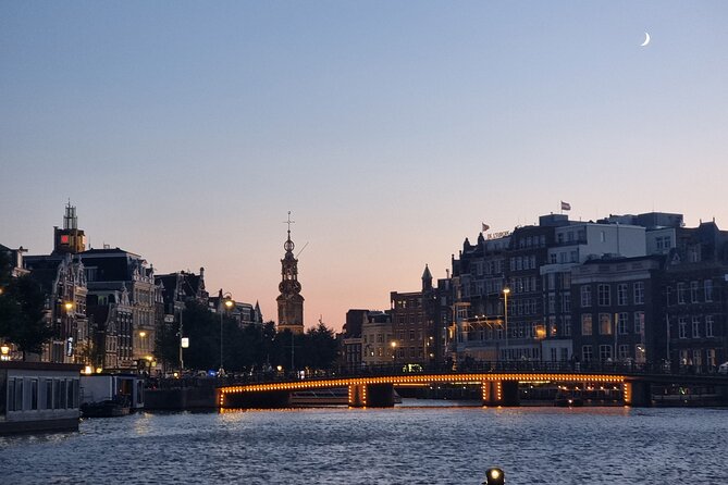 Amsterdam Private Boat Tour With Drinks - EN ES FR - A classic Dutch drawbridge myth, then Stopera’s old-versus-new contrast