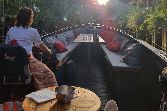 Amsterdam Private Boat Tour With Drinks - EN ES FR - Waterlooplein and the red-light district: how the tour frames it with care