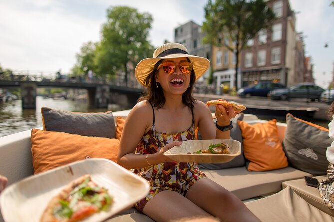 Amsterdam Private Boat Trip with Pizza and Unlimited Drinks - Meeting at Oosterdokskade 8, close to Centraal Station