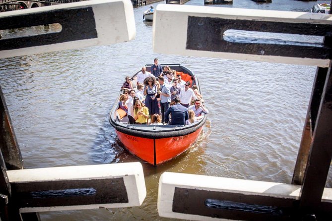 Amsterdam Private Boat Trip With Skipper, Burger and Beers - Hermitage’s Amsterdam branch, the Amstel bridge, and the floating flower market