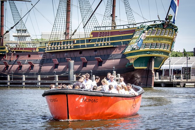 Amsterdam Private Boat Trip With Skipper, Burger and Beers - Houseboats, mansion-lined canals, Central Station, and medieval hints near Oudeschans
