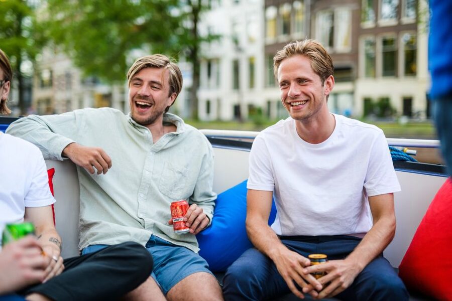 Amsterdam: Private Canal Booze Cruise with Unlimited Drinks - Amstel 178 Meeting Point and Boarding Like a Local